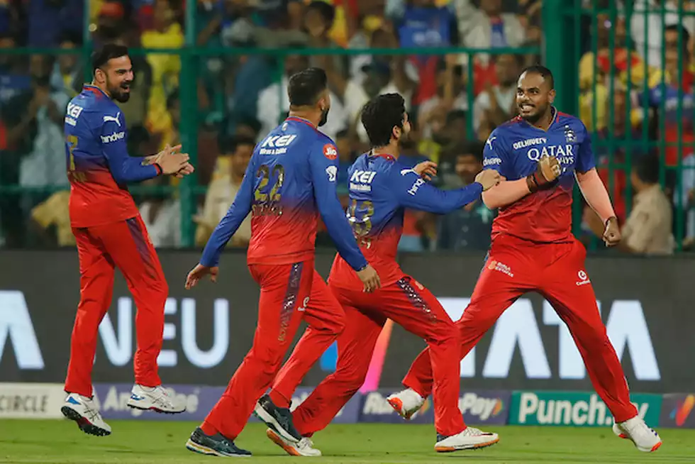 RCB clinched their sixth straight win in a thrilling match against CSK, blending precise strategy and emotional highs. Discover how they embraced both maths and moments for a historic victory.