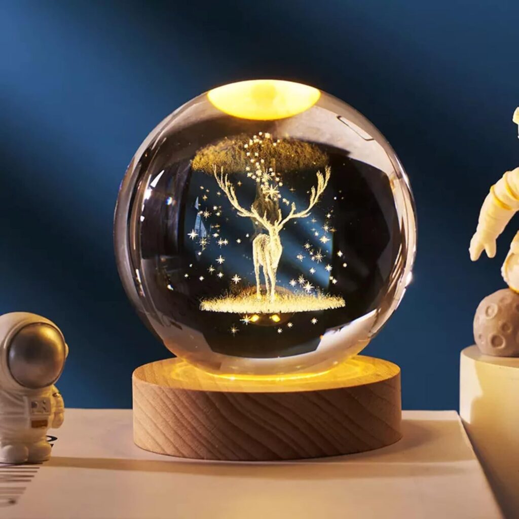 Discover the One94Store 3D Deer Crystal Globe Lamp, a creatively engraved crystal ball night light with a warm white LED. Perfect for home/office decor or a unique birthday gift.