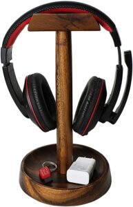 Discover the UHUD CRAFTS Headphone Tabletop Stand, a stylish and functional wooden headphone holder for gamers and music lovers. Perfect for any desk, it offers an elegant storage solution with a solid heavy base.