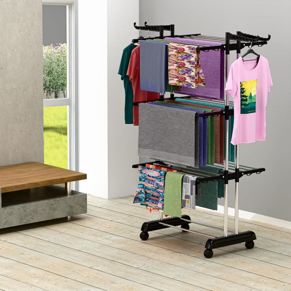 Discover the BrandFlex Foldable Stainless Steel Cloth Drying Stand (3-Tier) – a heavy-duty, rust-proof laundry rack with wheels, hanger slots, and space-saving design. Perfect for balcony, bedroom & bathroom use. Dry clothes smartly indoors & outdoors!