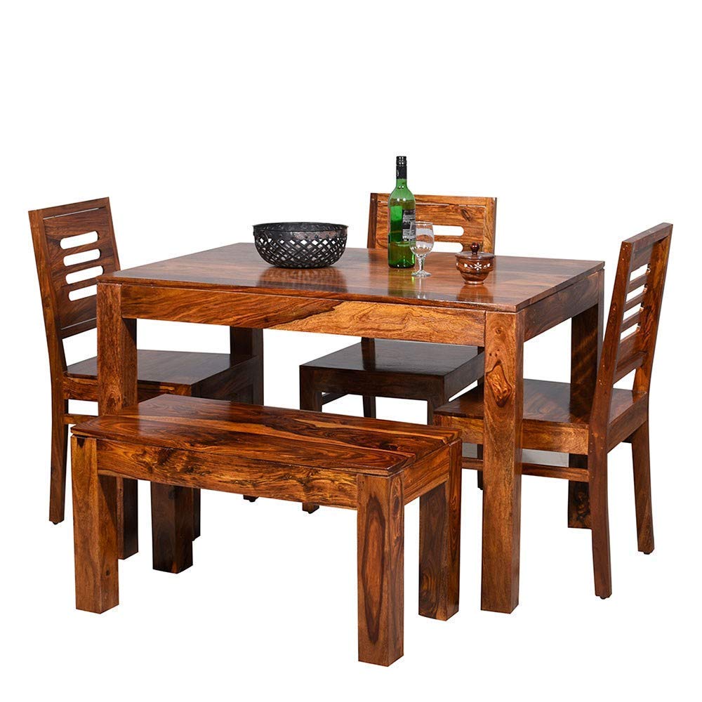 Transform your dining room with the MURALICRAFT Wooden Dining Table 4 Seater. Solid Sheesham wood, honey finish, elegant design & space-saving style.