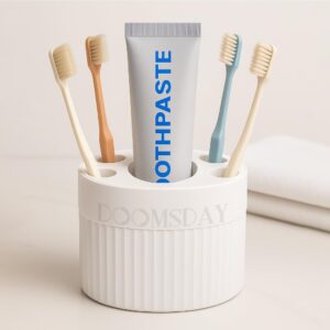 Upgrade your bathroom with the DOOMSDAY Toothbrush & Toothpaste Organizer! Waterproof, modern, and no-drill—perfect for every family.