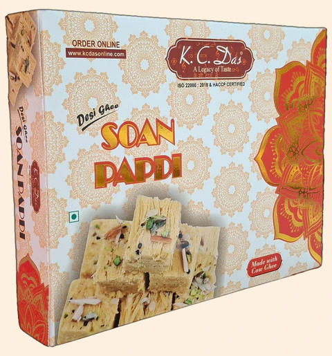 Indulge in the delectable sweetness of KC Das Soanpapri, a traditional Indian dessert that promises to melt in your mouth with every bite. Made with the finest ingredients, including sugar, gram flour, pure cow ghee, pistachio, cardamom, and an assortment of premium nuts, this 500-gram pack is the perfect treat for any occasion.