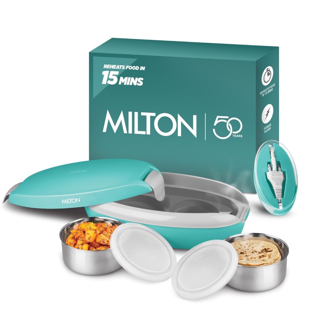 Enjoy hot homemade food anywhere with Milton Swiftron Electric Lunch Box. No microwave needed, auto shut-off safety, cool-touch body & 1-year warranty.