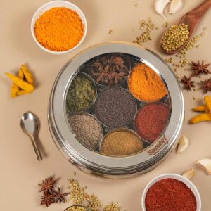 Looking for the best spice organizer? Read this detailed review of the Sumeet Stainless Steel Belly Shape Masala (Spice) Box with 7 containers, see-through lid, and spoon. Durable, rust-proof, and dishwasher safe!